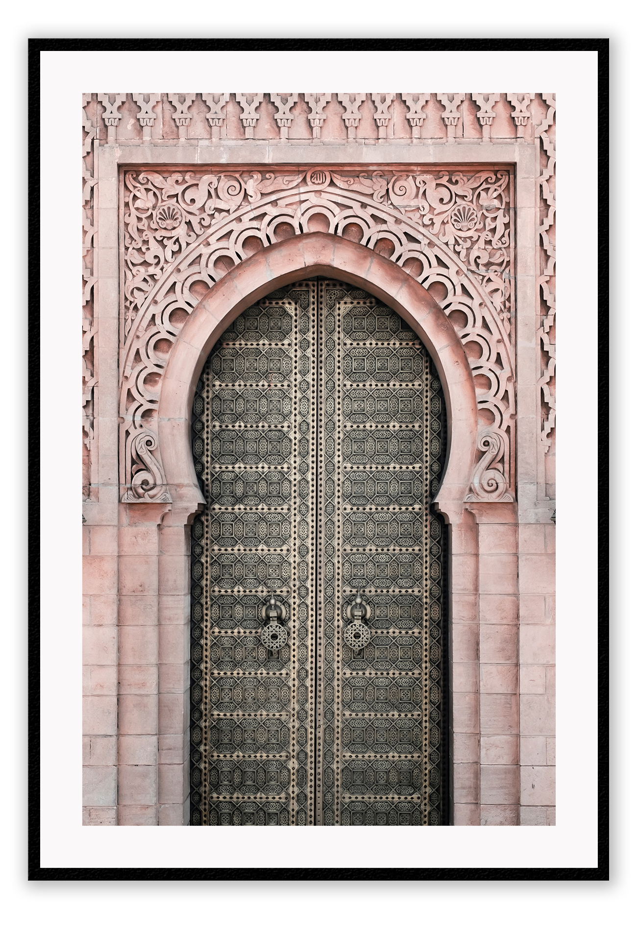 A classic morrocan architecture wall art with a pink door front and great relief carving details.