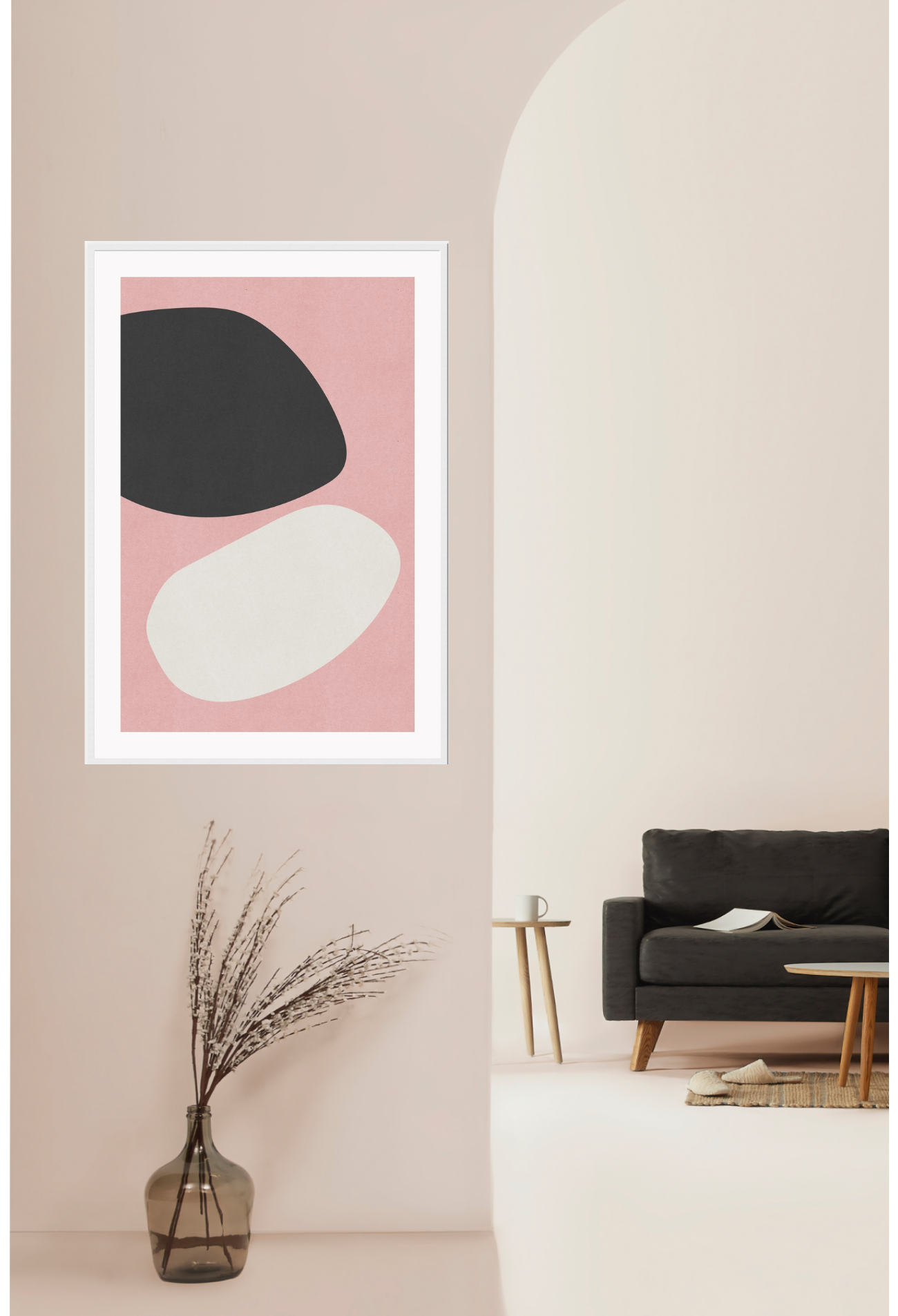 Abstract wall art with pink background and black and white spots
