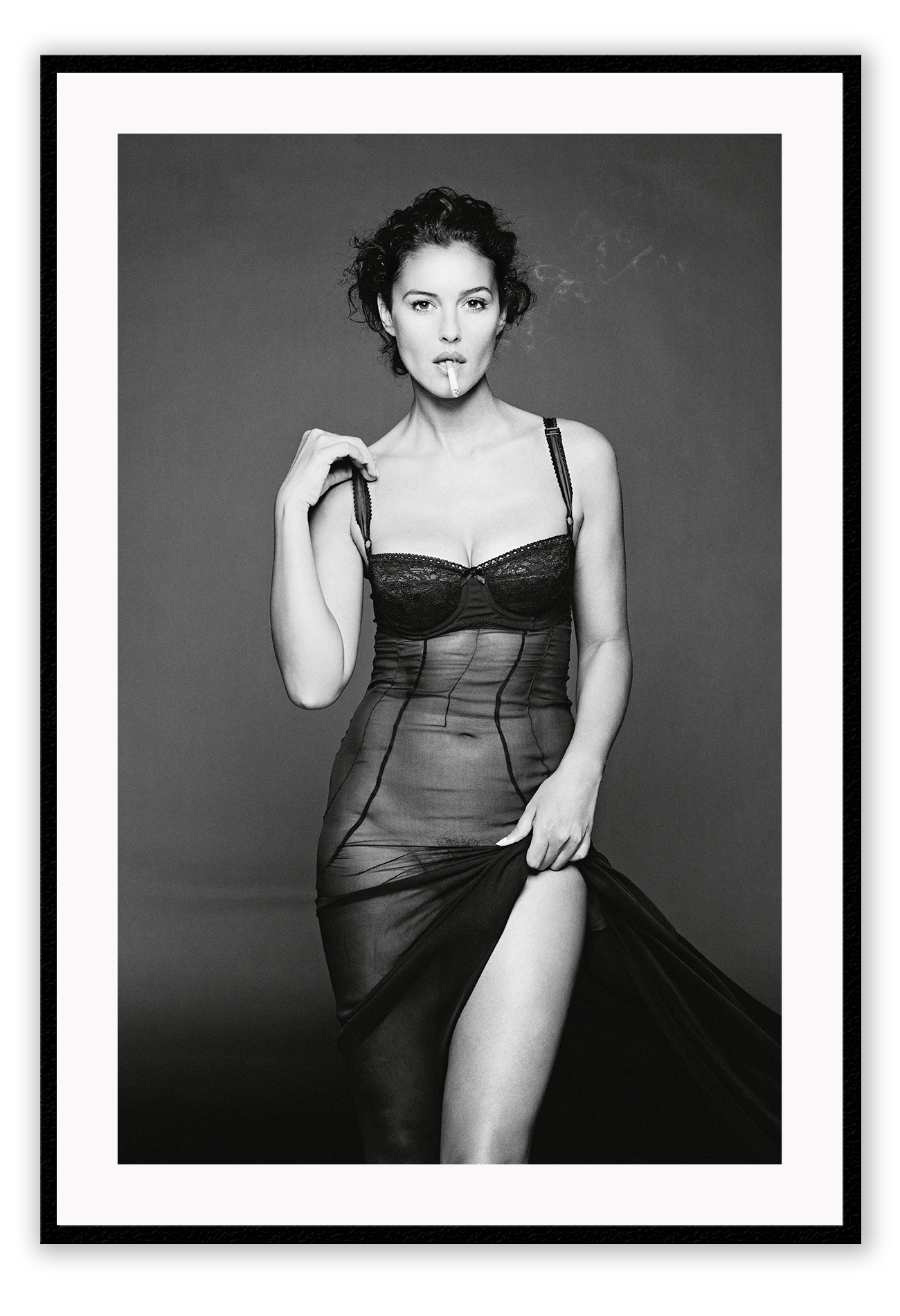 This image features a striking black and white photograph of Monica Bellucci, captured in a portrait orientation. Displayed in a high-quality, custom-made matte wood frame, the print is mounted on perspex glass that enhances its clarity and finish.