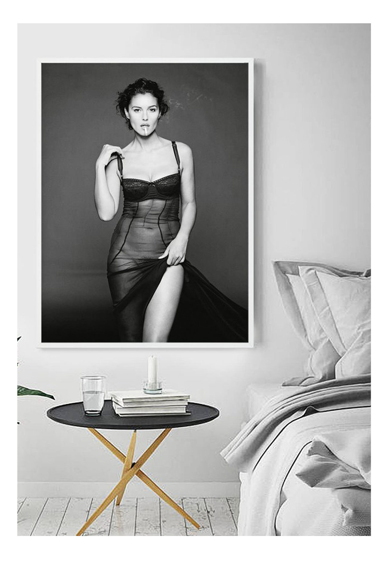 This image features a striking black and white photograph of Monica Bellucci, captured in a portrait orientation. Displayed in a high-quality, custom-made matte wood frame, the print is mounted on perspex glass that enhances its clarity and finish. HUng in a bedroom on white wall next to bed.