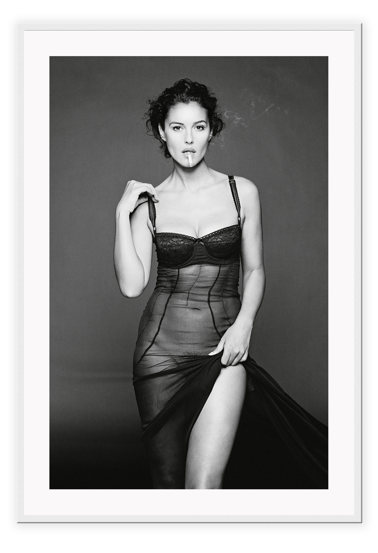 This image features a striking black and white photograph of Monica Bellucci, captured in a portrait orientation. Displayed in a high-quality, custom-made matte wood frame, the print is mounted on perspex glass that enhances its clarity and finish.