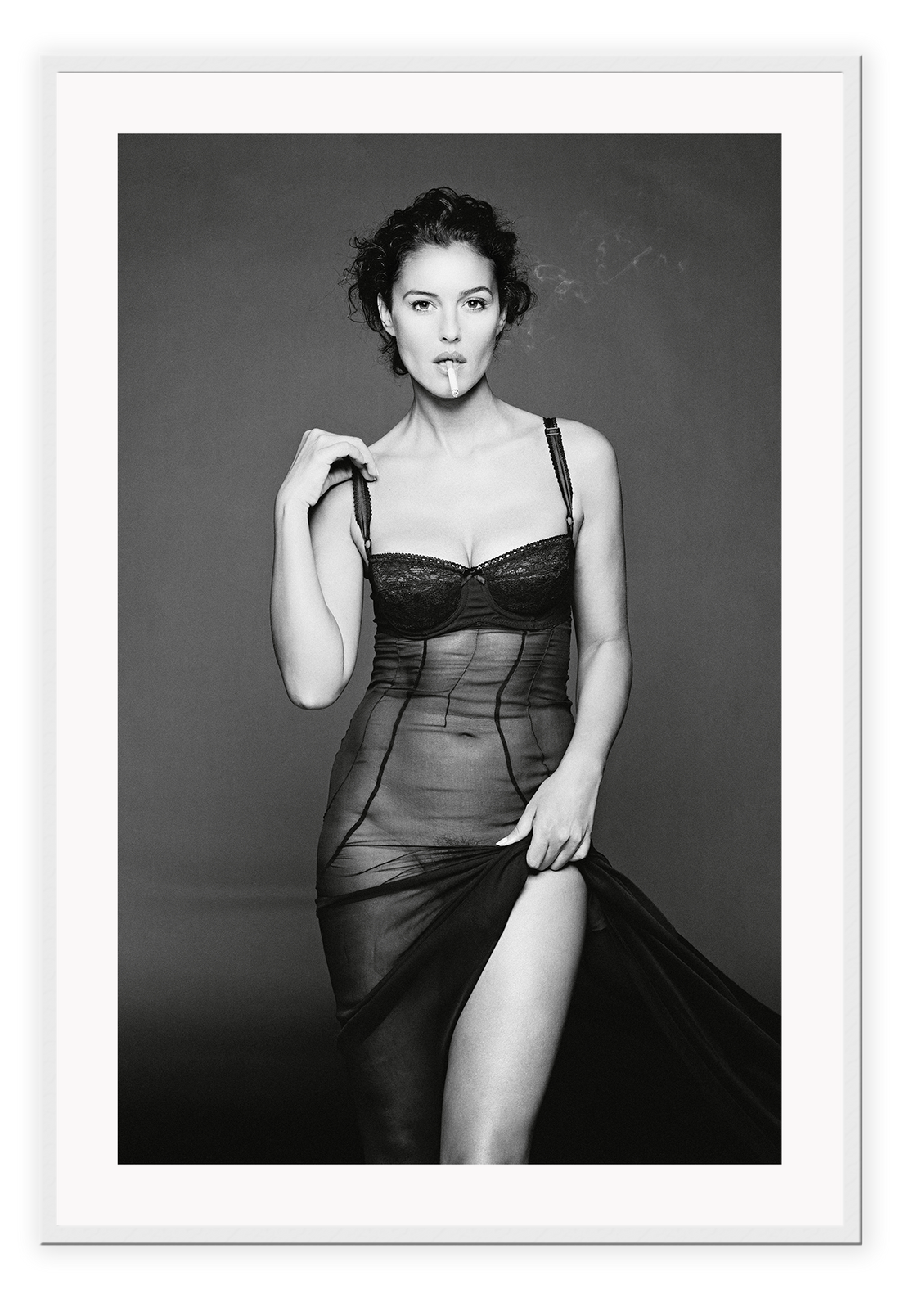 This image features a striking black and white photograph of Monica Bellucci, captured in a portrait orientation. Displayed in a high-quality, custom-made matte wood frame, the print is mounted on perspex glass that enhances its clarity and finish.