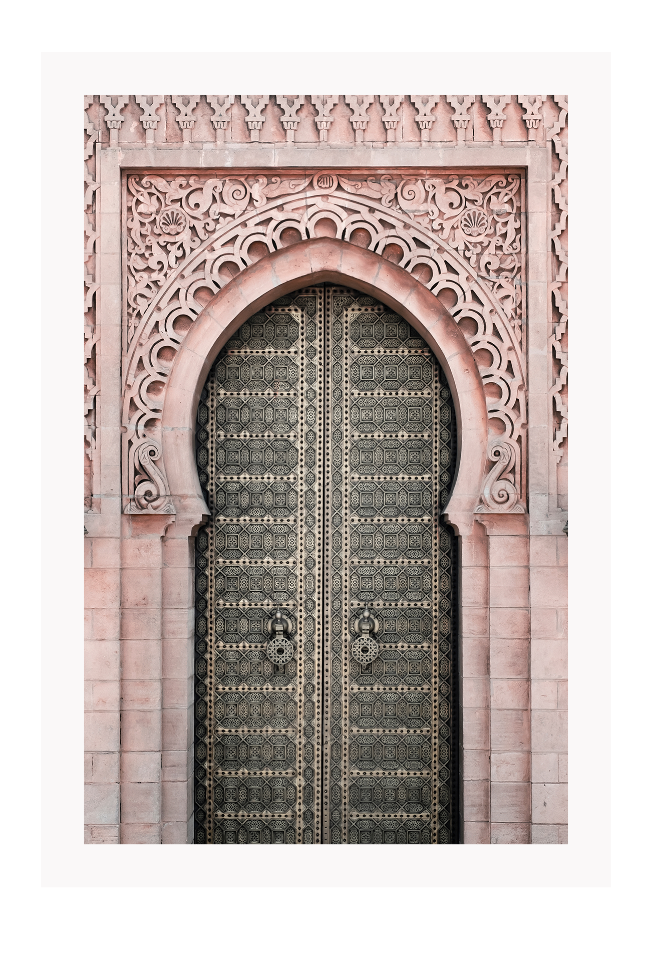 A classic morrocan architecture wall art with a pink door front and great relief carving details.