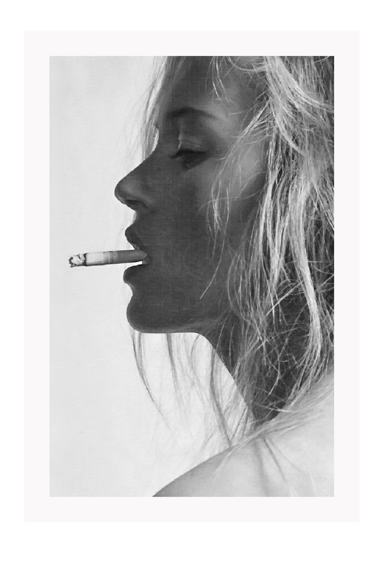 A black and white fashion  photographic wall art with iconic 90s model Kate Moss smoking cigarette.