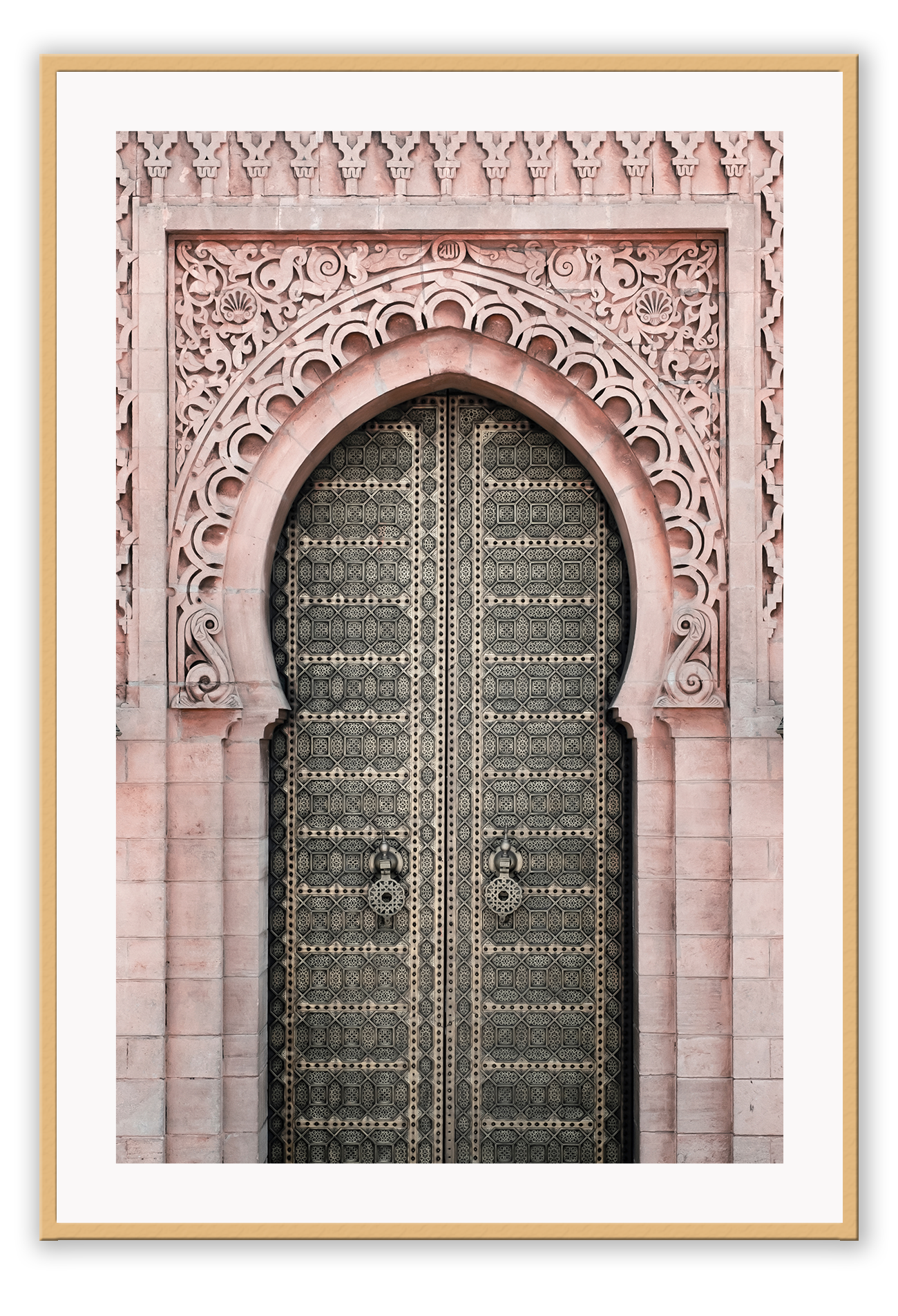 A classic morrocan architecture wall art with a pink door front and great relief carving details.