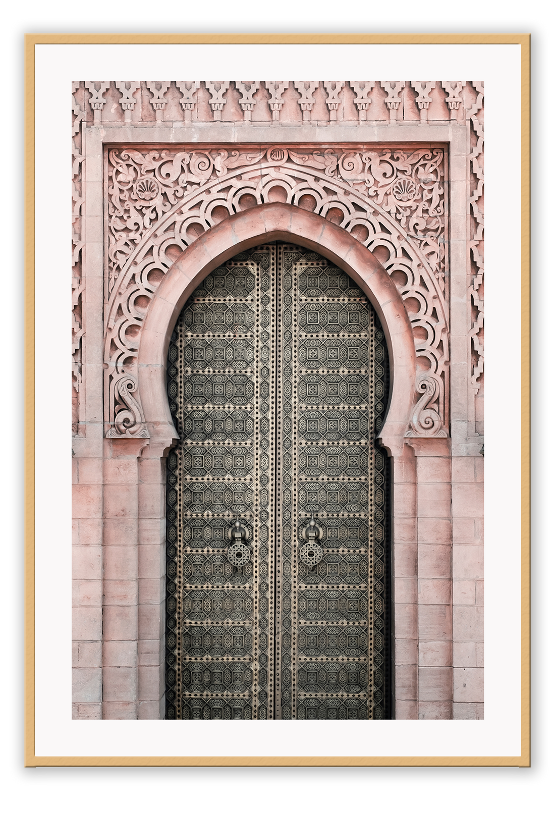 A classic morrocan architecture wall art with a pink door front and great relief carving details.