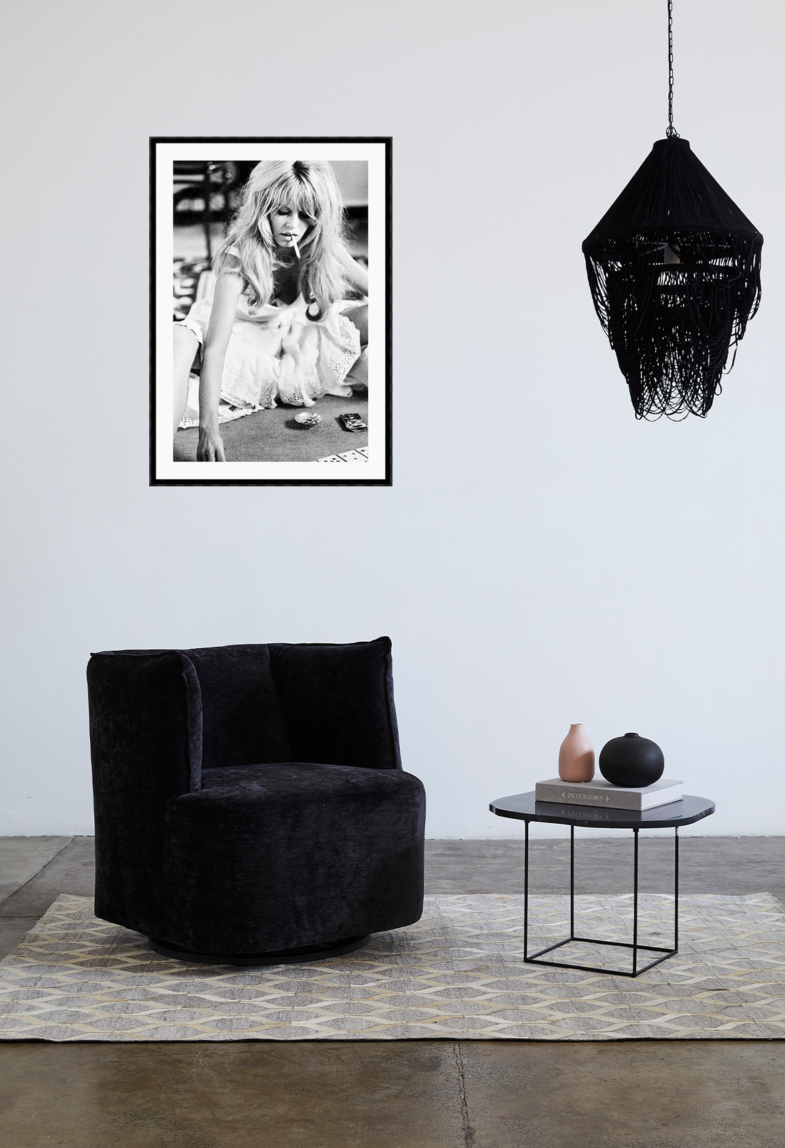 Bardot model celebrity black and white smoking cards playing print portrait blonde sexy lingerie, placed on white wall above black chair