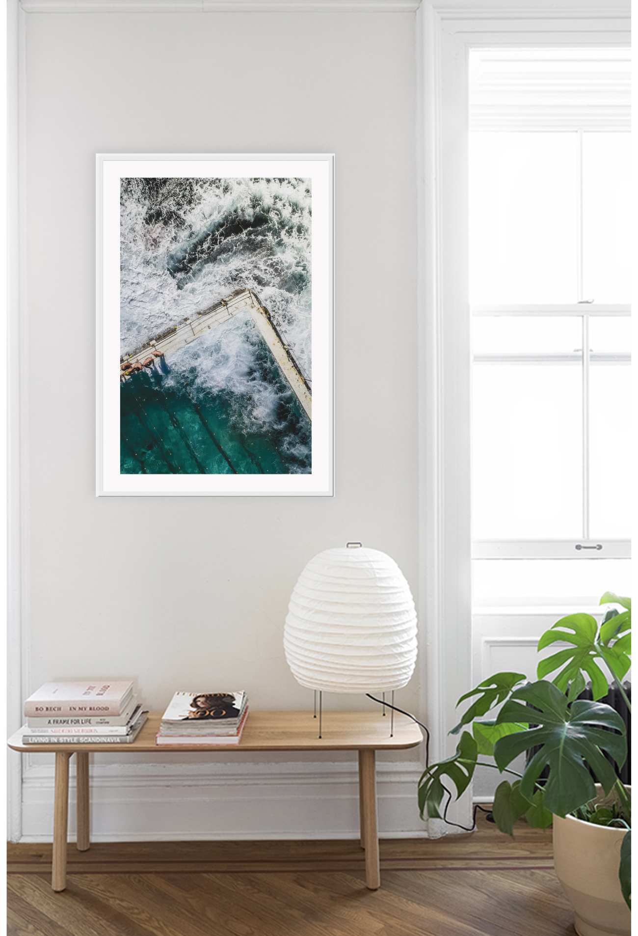 Overhead photo of ocean swimming pool with waves crashing.
