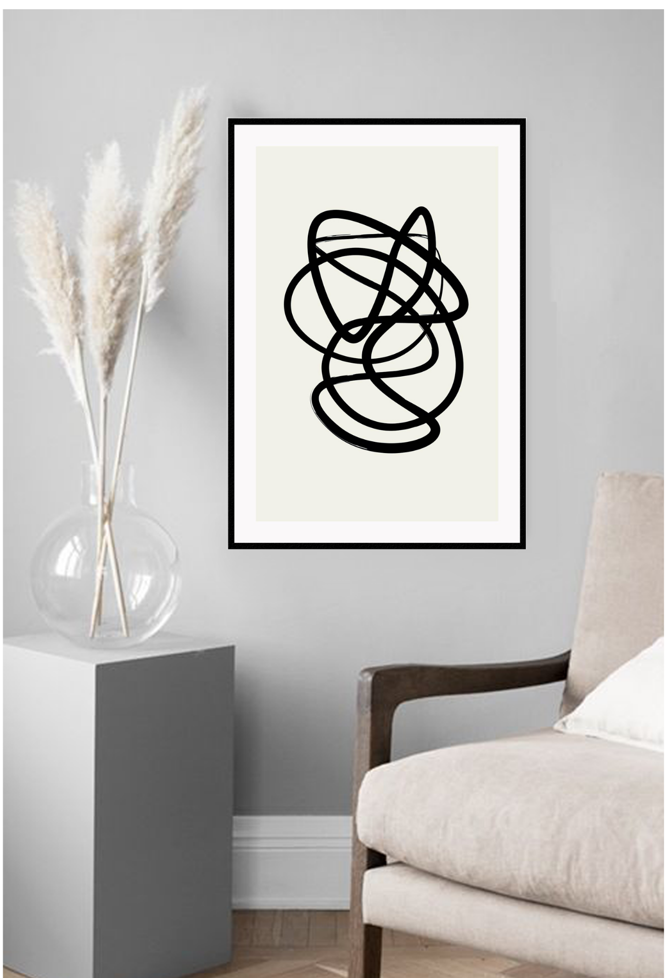 Abstract black and white squiggle print with textured black line and cream background 