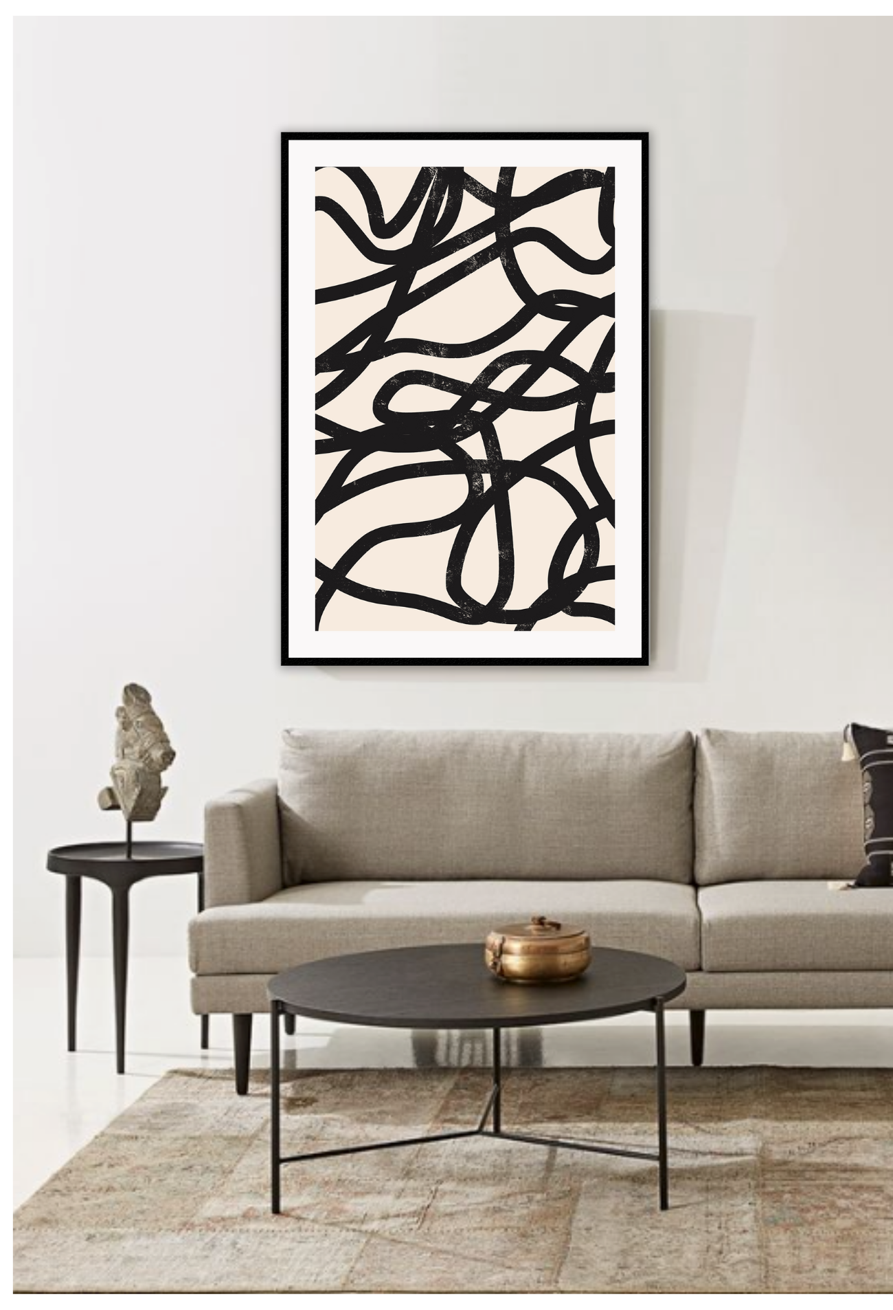 Abstract art print of several black squiggly lines in brushstroke texture on a plain beige background.