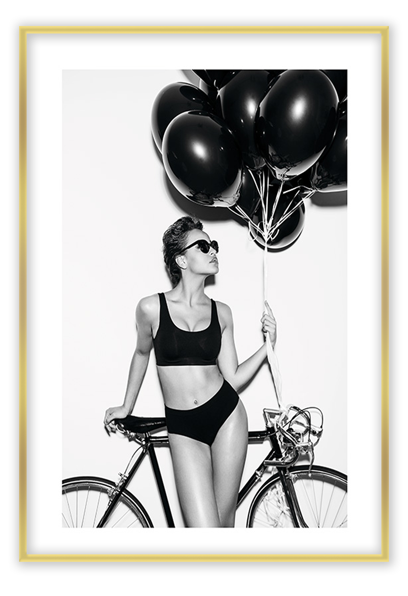 A fashion black and white wall art with a lady in lingerie holding balloons
