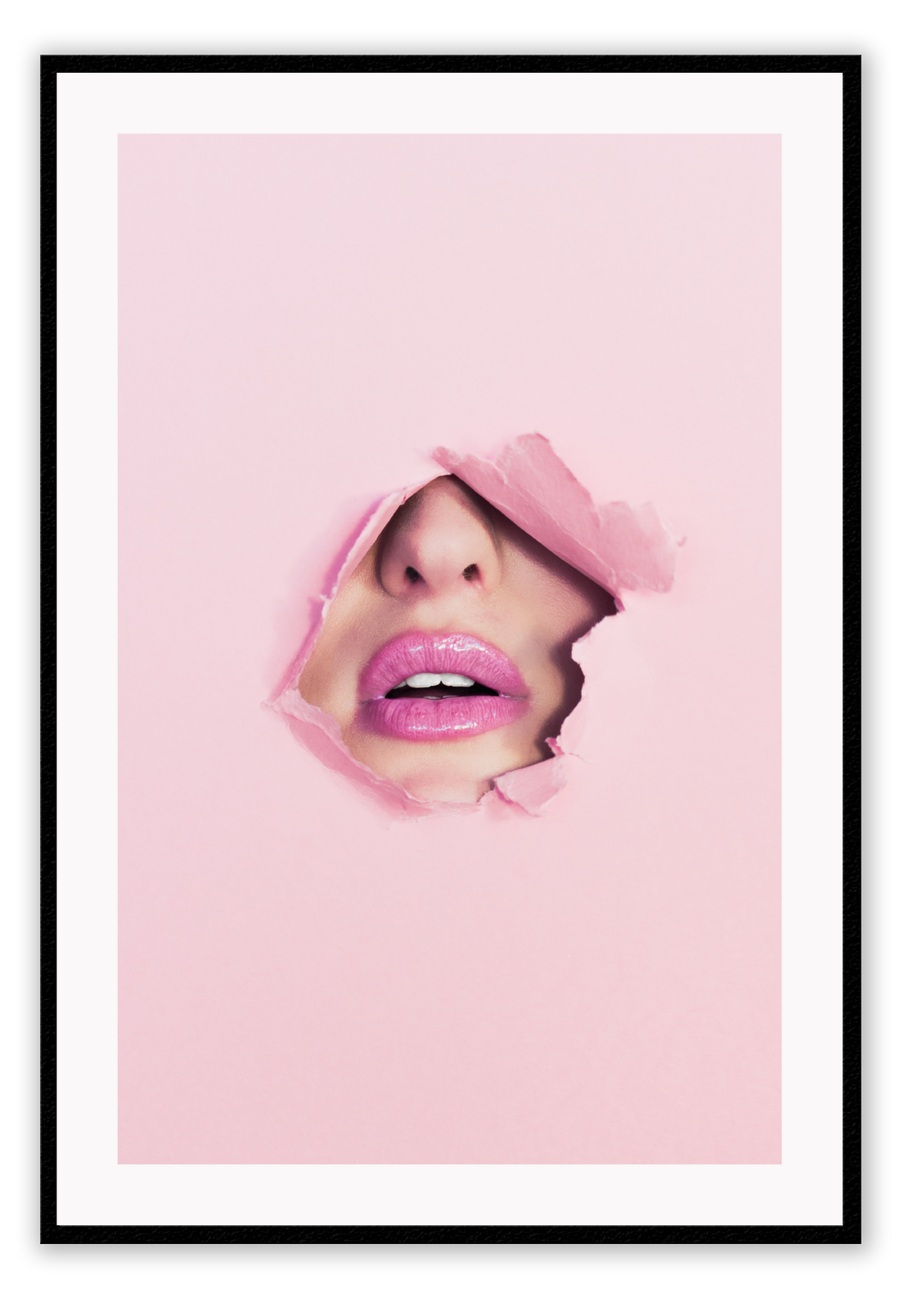 A pink wall art with fashion model face and pink lips. 