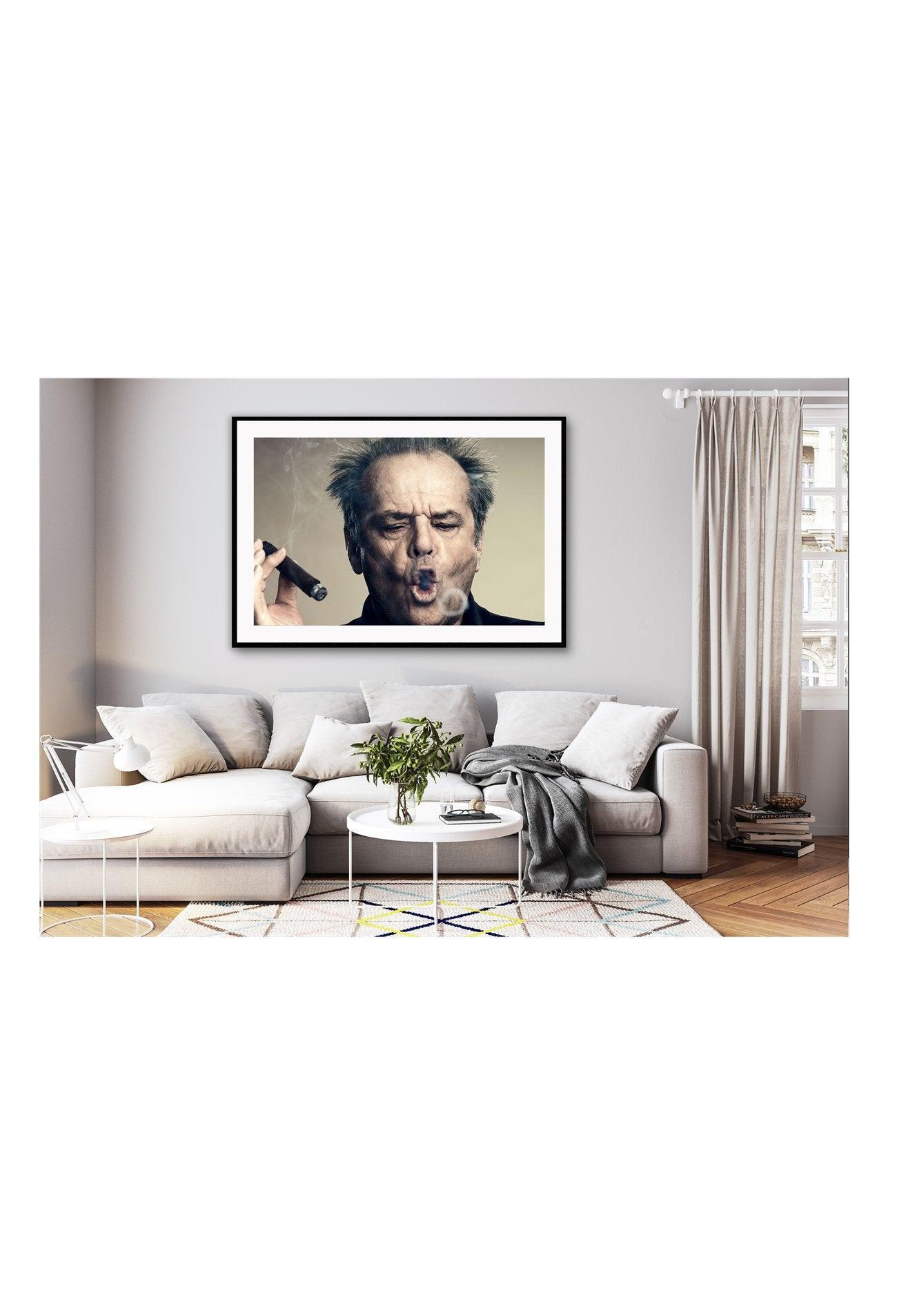 This image features a framed print of Jack Nicholson, captured in a iconic and expressive pose. The print is mounted on high-quality matte paper, offering a realistic and vibrant depiction of the subject. Set on a wall in a luxury lounge room.