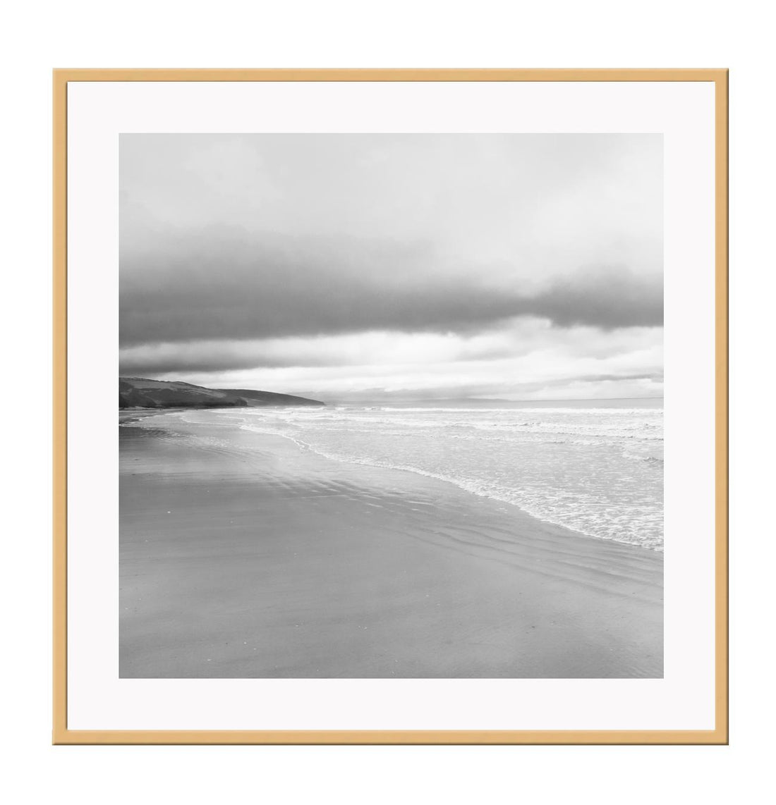 Black and white photograph of a beach scene with framed print boundaries.