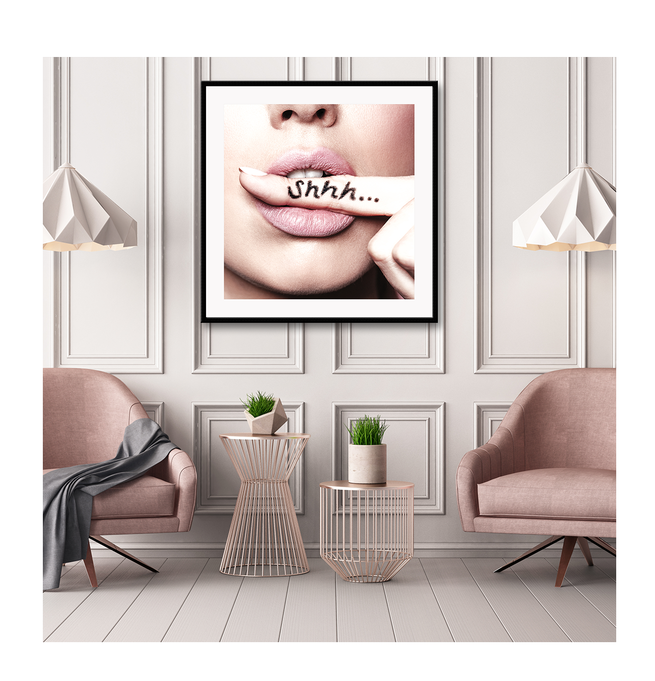 Artwork depicting the lips of a person with finger in mouth with the word 'Shhh...' written on it, framed in a matte black frame on a wall in a fashionable room.