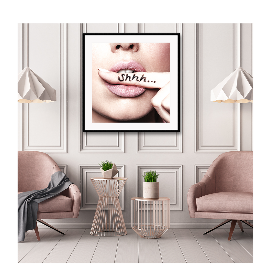 Artwork depicting the lips of a person with finger in mouth with the word 'Shhh...' written on it, framed in a matte black frame on a wall in a fashionable room.